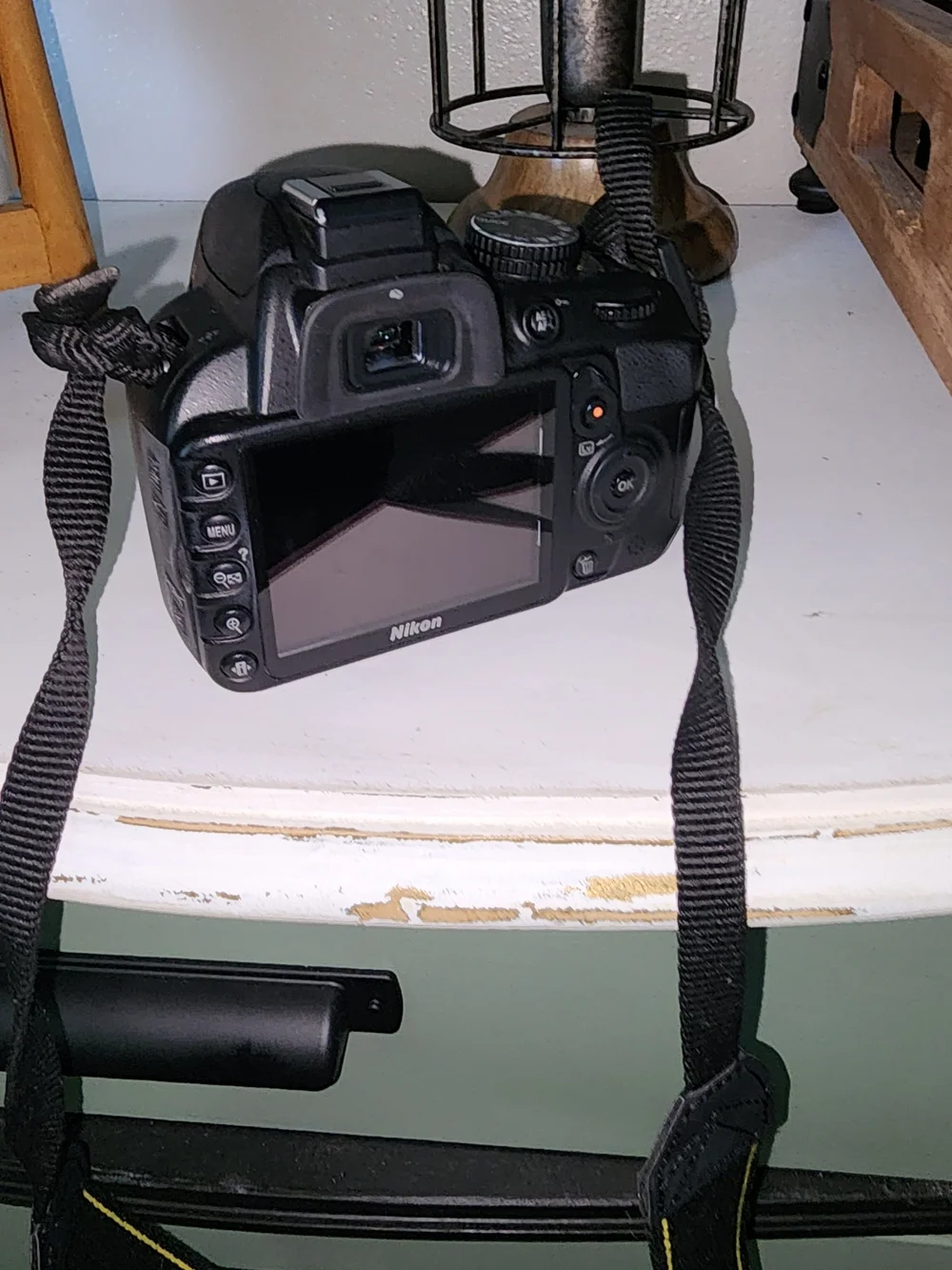 Nikon black DSLR Camera Body with Two Black Zoom Lenses